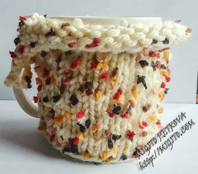 Porcelain cup with a cheerful hand-knitted garment
